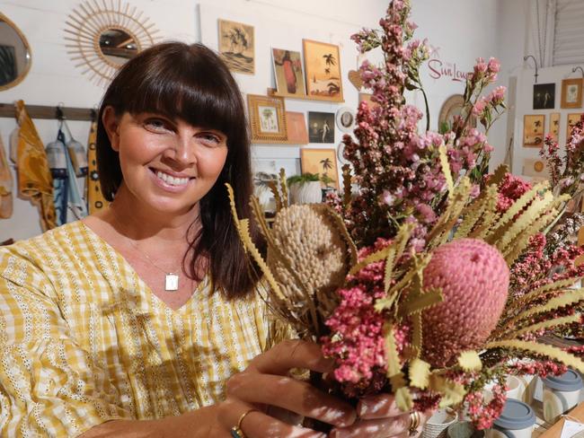 Gold Coast store Heartfill is one of a number of retailers offering homegrown alternatives for Christmas gifts this year. Owner Corinne Russell working on her displays at the Miami store. picture Glenn Hampson