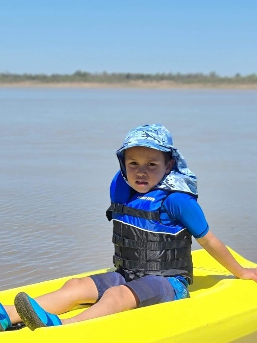 Sheldon Shorey, 6, kayaking with his family.