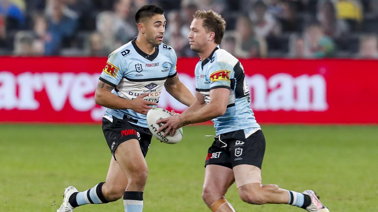 Matt Moylan of the Sharks in possession with Shaun Johnson in support during the Round 6 NRL match between the Cronulla-Sutherland Sharks and the Canterbury-Bankstown Bulldogs at Bankwest Stadium in Sydney, Sunday, June 21, 2020. (AAP Image/David Neilson) NO ARCHIVING, EDITORIAL USE ONLY