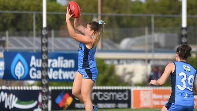 Sturt SANFLW co-captain Georgia Bevan marks the ball while teammate Alysha Healy watches on. Picture: Peter Swan