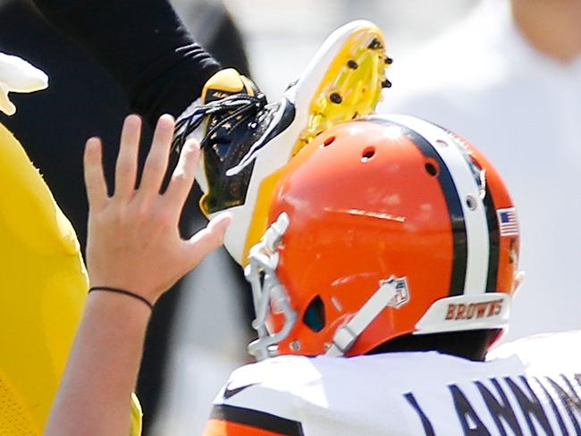 PITTSBURGH, PA - SEPTEMBER 7: Antonio Brown #84 of the Pittsburgh Steelers attempts to hurdle Spencer Lanning #5 of the Cleveland Browns and gets an unnecessary roughness penalty during the second quarter at Heinz Field on September 7, 2014 in Pittsburgh, Pennsylvania. (Photo by Gregory Shamus/Getty Images) *** BESTPIX ****