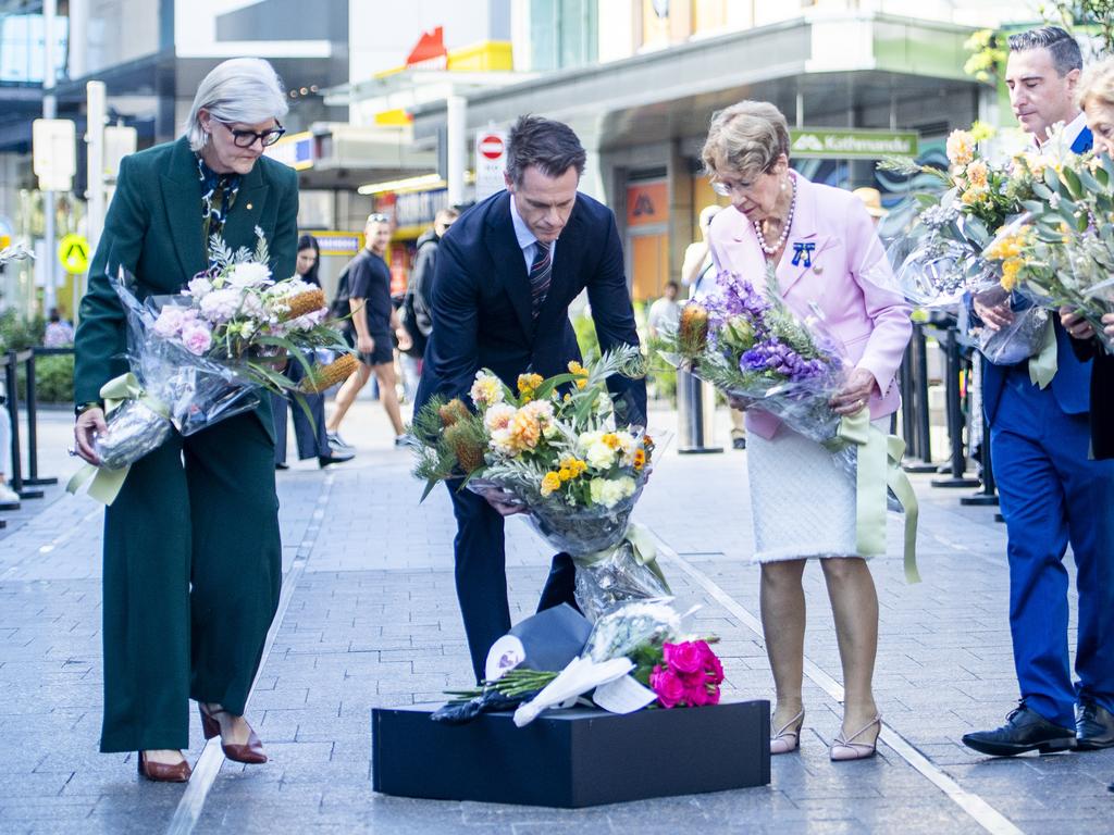 Premier Chris Minns lays flowers and takes a moment to reflect on the one-year anniversary of the Westfield Bondi stabbing that killed 6 people. Picture: NewsWire / Jeremy Piper