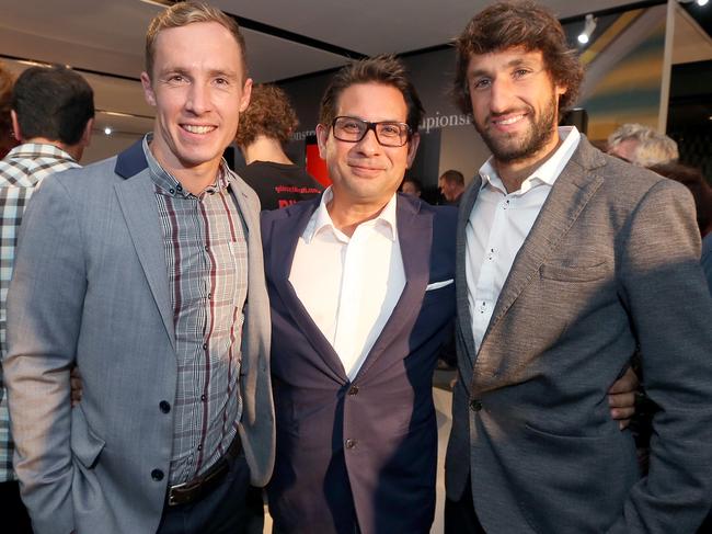 Roar chairman Chris Fong (centre), pictured with Brisbane greats Matt Smith (right) and Thomas Broich, is thrilled about the revamped Ballymore Stadium. Picture: Stephen Archer