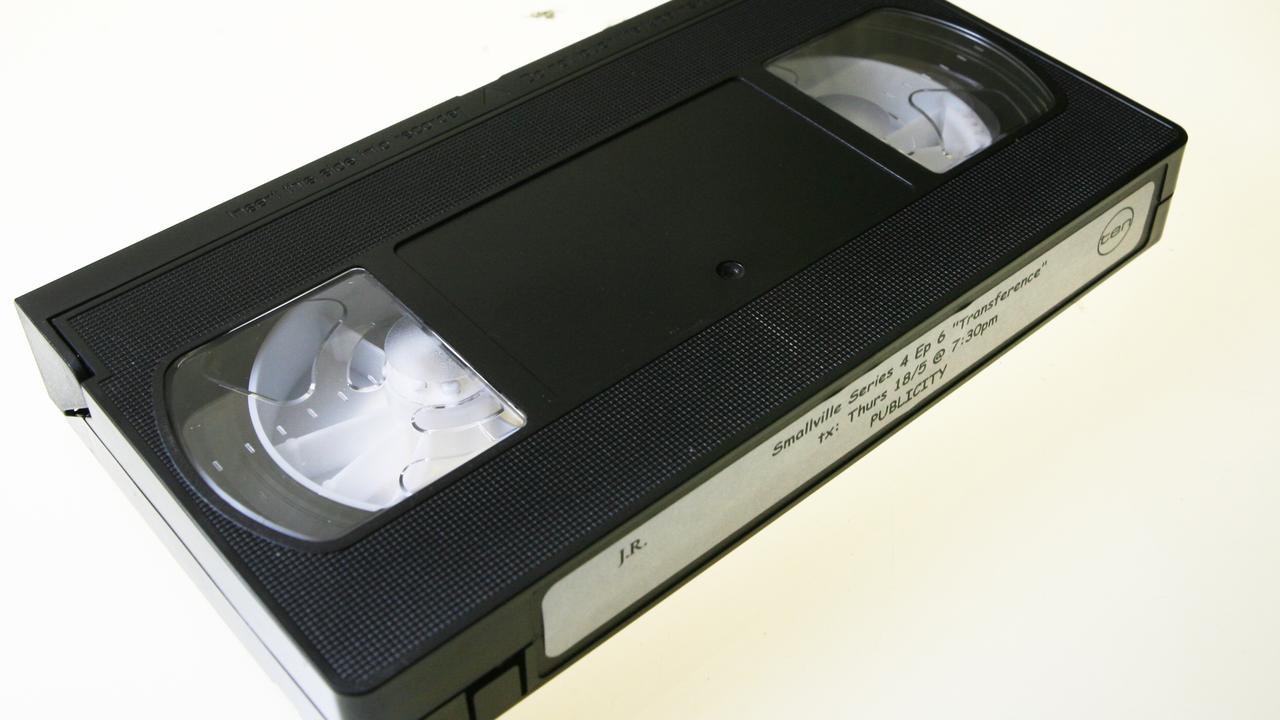 Please enjoy this generic image of a classic VHS cassette in its natural habitat.