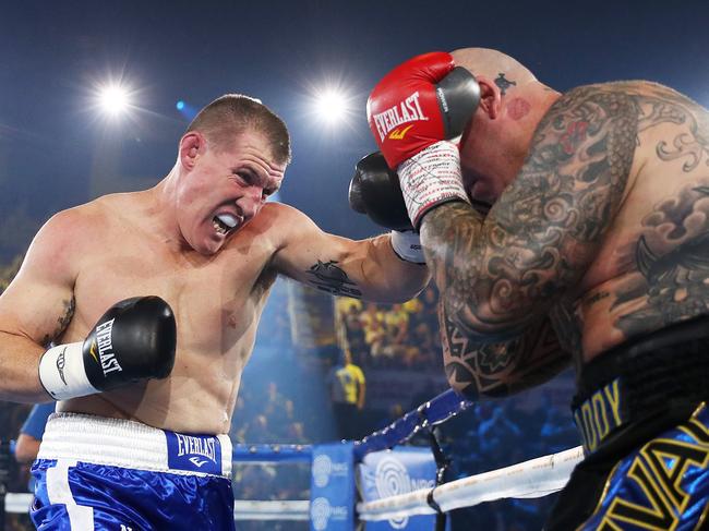 WOLLONGONG, AUSTRALIA - APRIL 21: Paul Gallen punches Lucas Browne during their bout at WIN Entertainment Centre on April 21, 2021 in Wollongong, Australia. (Photo by Mark Metcalfe/Getty Images)