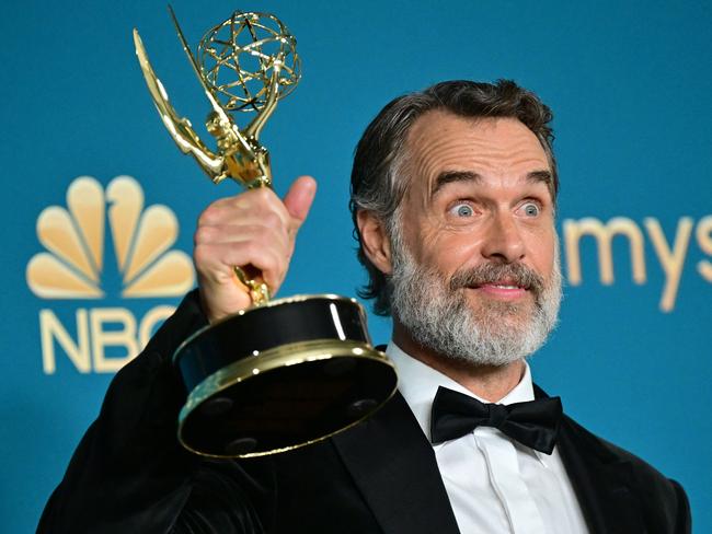 Australian actor Murray Bartlett poses with the Emmy for Outstanding Supporting Actor In A Limited Or Anthology Series Or Movie for "The White Lotus" during the 74th Emmy Awards at the Microsoft Theater in Los Angeles, California, on September 12, 2022. (Photo by Frederic J. Brown / AFP)