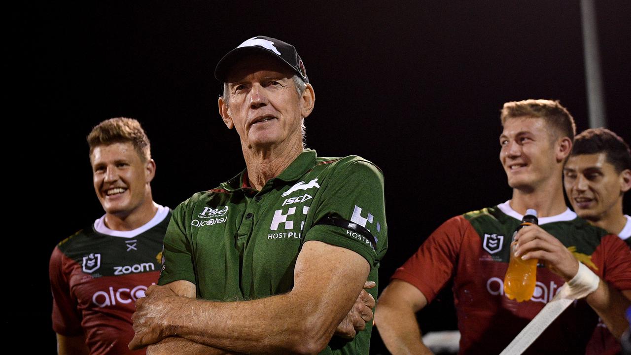 Rabbitohs coach Wayne Bennett (centre) speaks with players following their win over the Dragons in the Charity Shield NRL pre-season match between the St George-Illawarra Dragons and the South Sydney Rabbitohs at Glen Willow Stadium in Mudgee, NSW, Saturday, March 2, 2019. (AAP Image/Dan Himbrechts) NO ARCHIVING, EDITORIAL USE ONLY