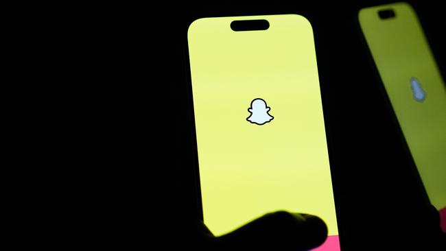 MELBOURNE, AUSTRALIA - NOVEMBER 30: In this photo illustration, the Snapchat app is open displayed on a phone on November 30, 2024 in Melbourne, Australia. Australia has recently enacted a groundbreaking law prohibiting individuals under the age of 16 from accessing social media platforms, marking one of the strictest regulations of its kind globally. This legislation, which holds social media companies accountable for enforcing the ban with potential fines of up to AUD 50 million, aims to protect young users from online dangers such as bullying and exploitation, reflecting a significant shift in how governments address youth safety in the digital age. (Photo Illustration by Asanka Ratnayake/Getty Images)