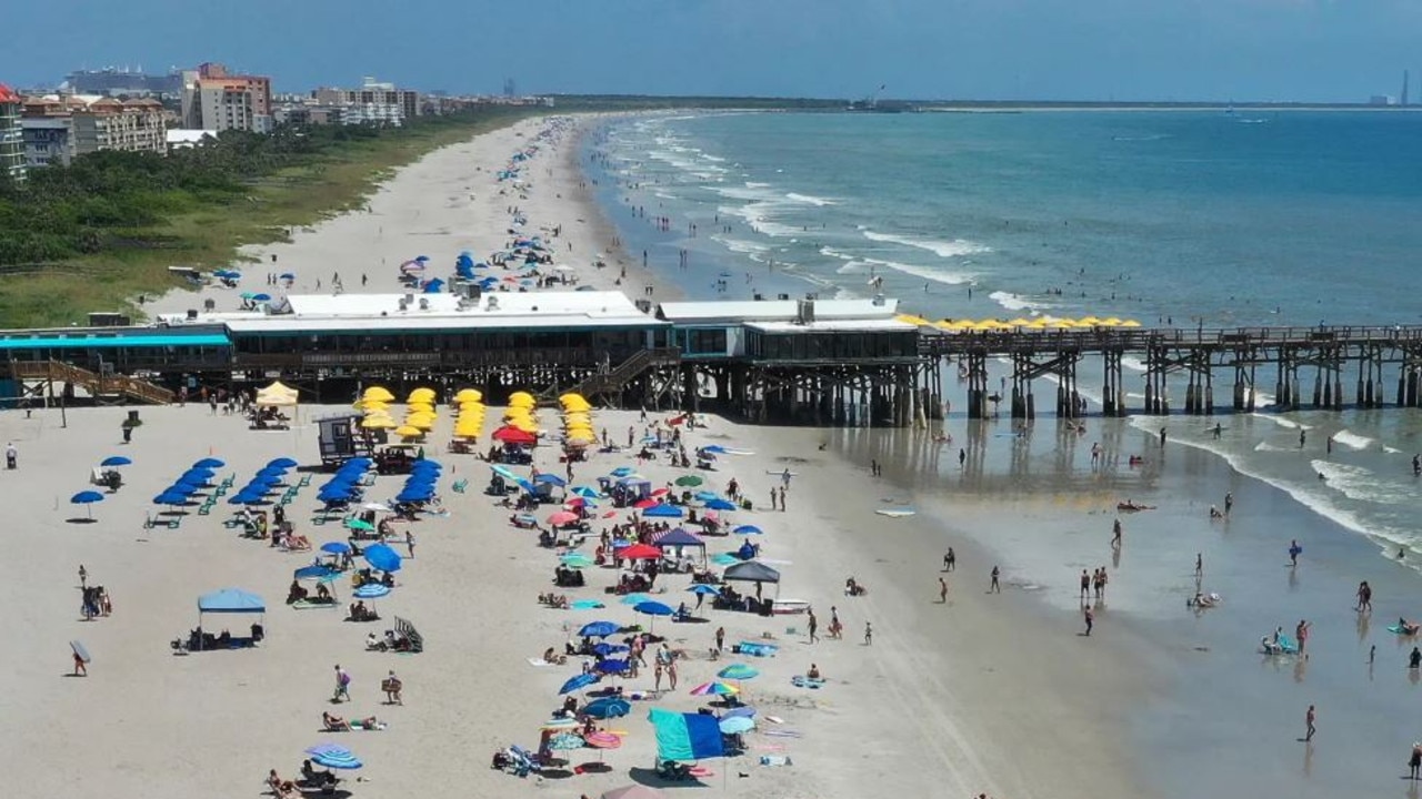 A woman was impaled by a rogue beach umbrella.