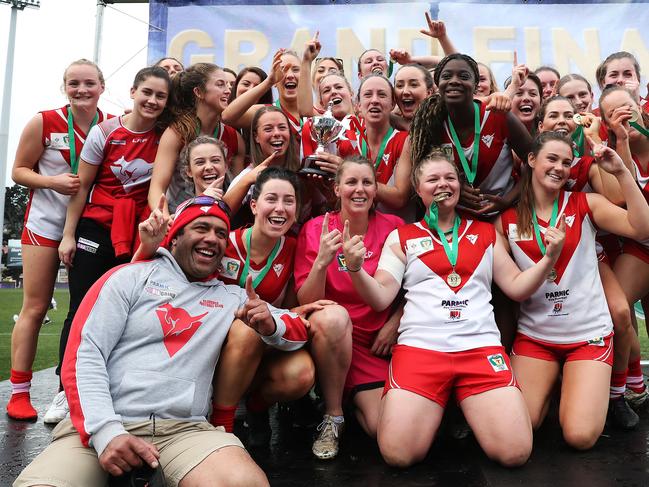 Clarence celebrate their grand final win. Picture: NIKKI DAVIS-JONES