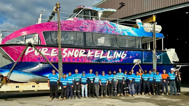 Pure Snorkelling and its Cairns builders. Photo: Supplied