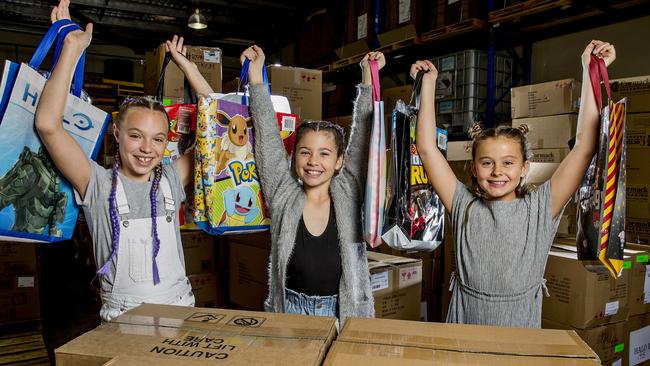 Tamikia Hine, 12, Bronte Quig, 10, and Jaz Fennell, 10, are excited to buy a showbag at the Gold Coast Show next weekend. Picture: Jerad Williams