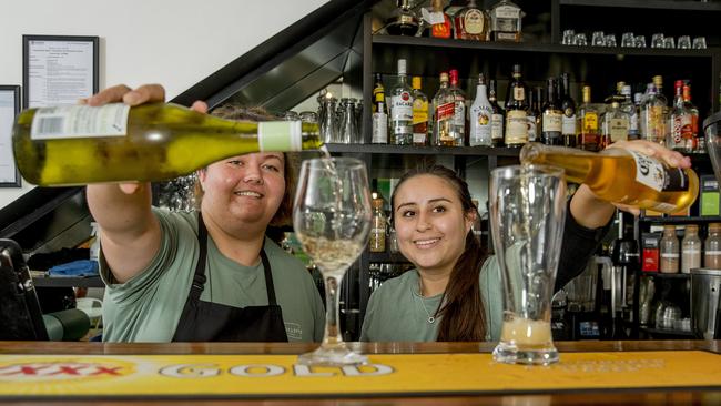 Staff members Toni Woods and Laura Reyes pouring drinks at Cafe Radcliffe in Paradise Point. Picture: Jerad Williams.