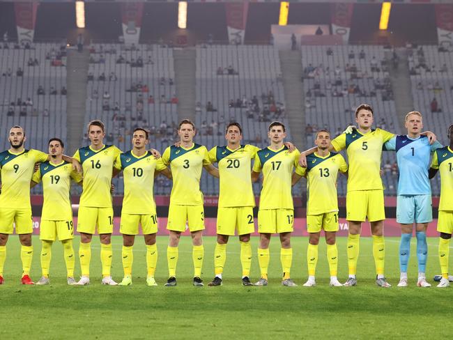 RIFU, MIYAGI, JAPAN - JULY 28: Players of Team Australia stand for the national anthem prior to the Men's Group C match between Australia and Eygpt on day five of the Tokyo 2020 Olympic Games at Miyagi Stadium on July 28, 2021 in Rifu, Miyagi, Japan. (Photo by Koki Nagahama/Getty Images)