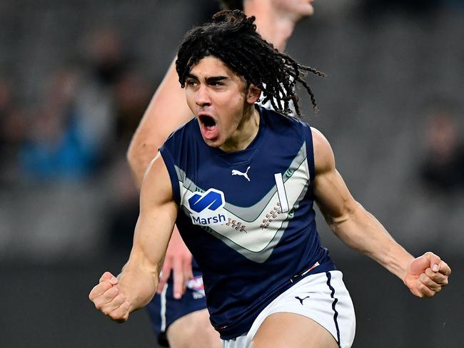 MELBOURNE, AUSTRALIA - JULY 14: Isaac Kako of Victoria Metro celebrates kicking a goal during the 2024 Marsh AFL Championships U18 Boys match between Victoria Metro and Victoria Country at Marvel Stadium on July 14, 2024 in Melbourne, Australia. (Photo by Josh Chadwick/AFL Photos)