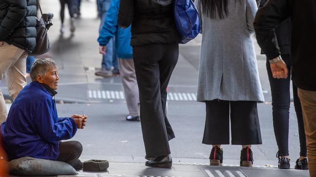 One of the women begging in Melbourne’s CBD. Picture: Jason Edwards