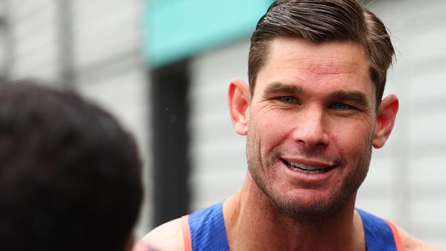 Tom Hawkins speaks to media at Geelong’s Wacky Wednesday celebration at the Wharf Shed. Picture: Morgan Hancock/Getty Images