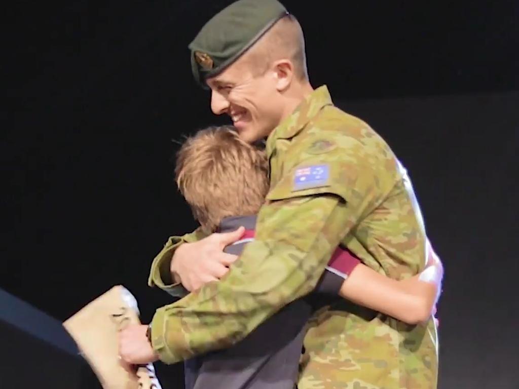 The father and son are reunited. Picture: Highlands Christian College