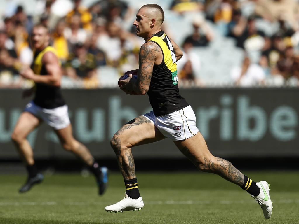 Dustin Martin breaks away against the Hawks.