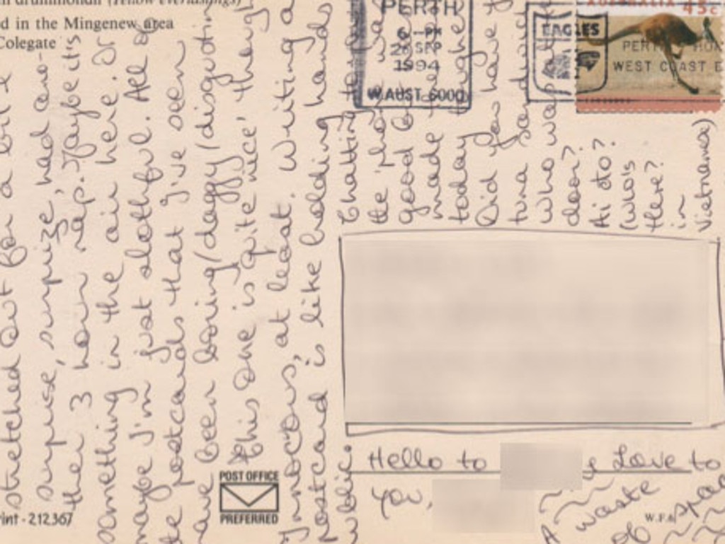 A postcard written by the accuser and sent to her ex-husband from Perth in 1994, shared here with his permission, with identifying details blurred. Picture: Supplied