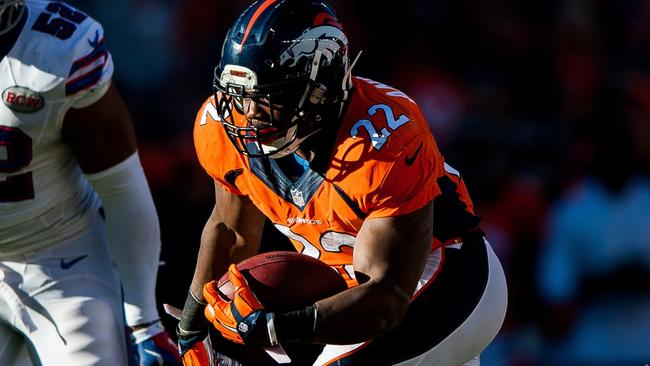 Running back C.J. Anderson #22 of the Denver Broncos rushes.