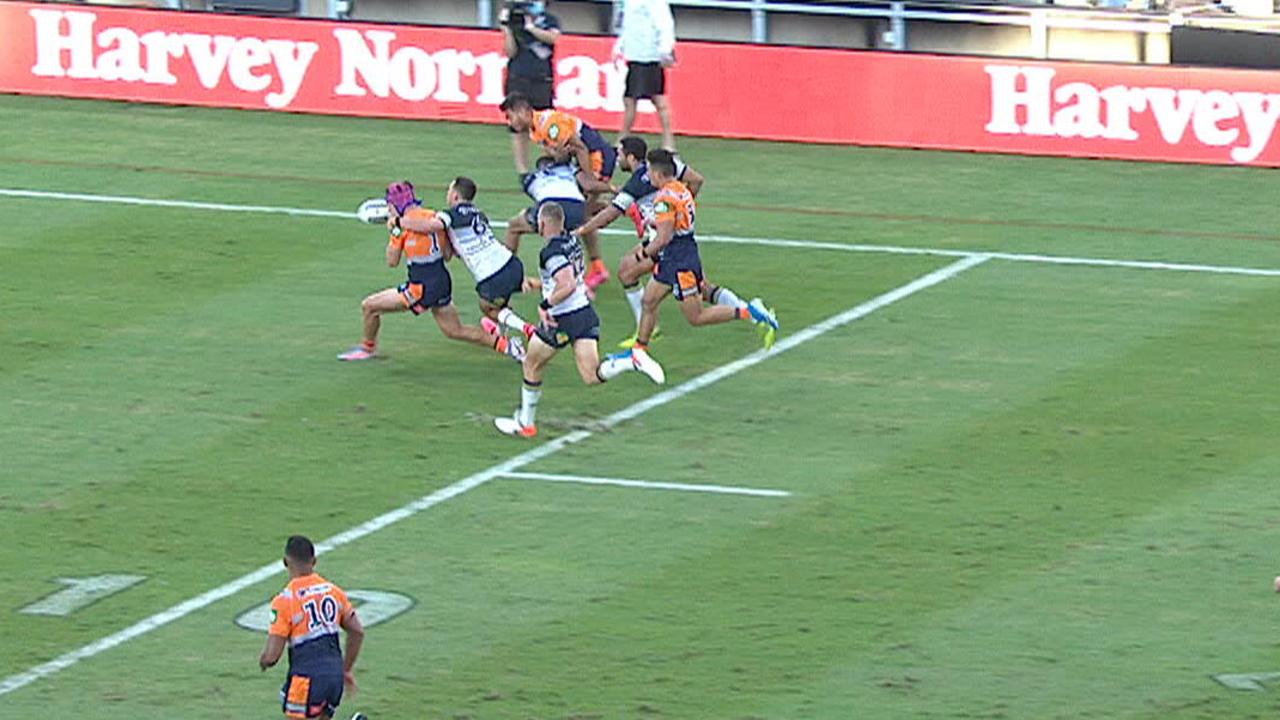 Kalyn Ponga is pulled by back by Scott Drinkwater