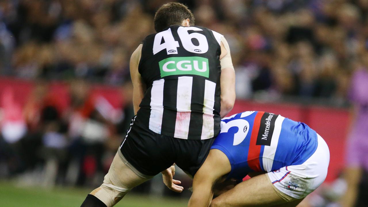 AFL players risk severe penalties for head-high bumps under new rules introduced for season 2022. Picture: Michael Klein