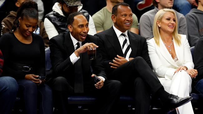 Smith alongside Timberwolves co-owner Alex Rodriguez at an NBA game earlier this season. (Photo by David Berding/Getty Images)