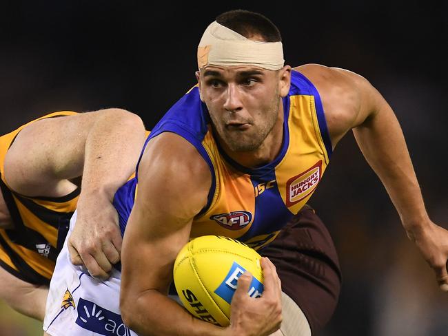 Jarryd Roughhead of the Hawks (left) and Dom Sheed of the Eagles contest during the Round 10 AFL match between the Hawthorn Hawks and the West Coast Eagles at Etihad Stadium in Melbourne, Sunday, May 27, 2018. (AAP Image/Julian Smith) NO ARCHIVING, EDITORIAL USE ONLY