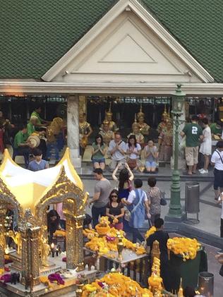 The Erawan Shrine, pictured earlier this year, is a popular shrine to the Hindu god Brahma and is visited by Buddhist devotees daily. (AP Photo/Charles Dharapak)