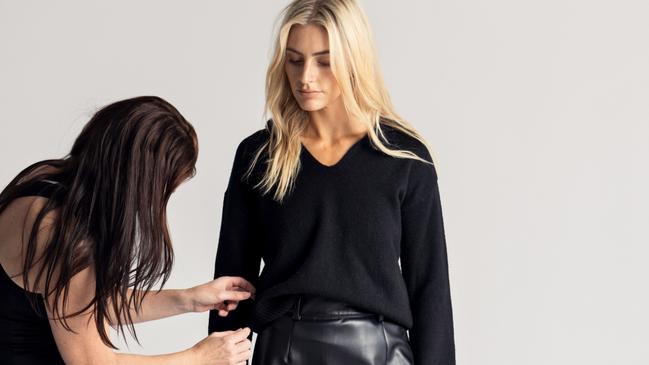 Romy The Brand. Clothing designed by Tasmanian fashion designer Emma Petterwood. Emma styling a model during a photo shoot. FOR TASWEEKEND. Picture: Supplied