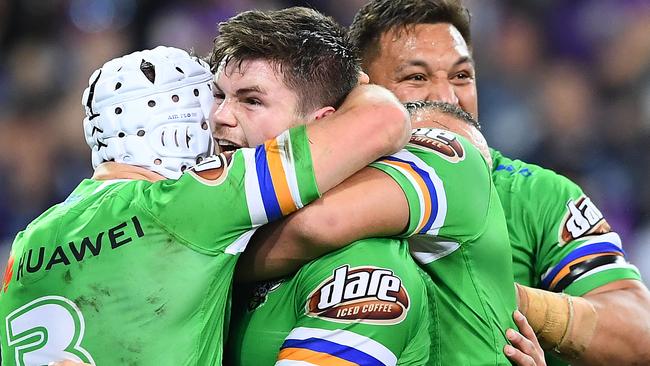 MELBOURNE, AUSTRALIA - SEPTEMBER 14: John Bateman of the Raiders is congratulated by team mates after scoring a try during the NRL Qualifying Final match between the Melbourne Storm and the Canberra Raiders at AAMI Park on September 14, 2019 in Melbourne, Australia. (Photo by Quinn Rooney/Getty Images)