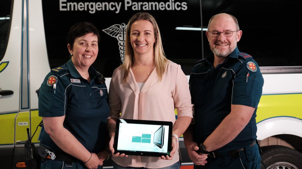 SPECIAL MOMENT: Kathy Wockner (centre), alongside paramedics Wendy Aitken (left) and David Hatchett, two of the ambulance staff who worked on her son Lucas when he was found unconscious and not breathing. . Picture: Matthew Newton