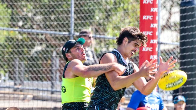 Recruit Brandon Zerk-Thatcher is tackled by Jeremy Finlayson. Picture: Russell Millard Photography