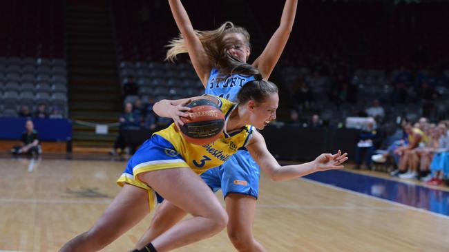 Forestville’s Rebekah Frisby-Smith muscles past Elissa Brett during the women’s Premier League grand final at Basketball SA Stadium on Saturday, Picture: AAP/Brenton Edwards