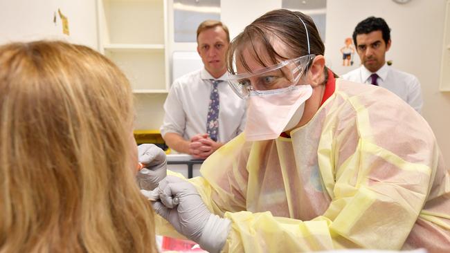 Queensland is preparing to introduce new rapid testing for pandemic coronavirus, expected to reduce the wait for results from up to three days to a few hours. Photo: Darren England, AAP.