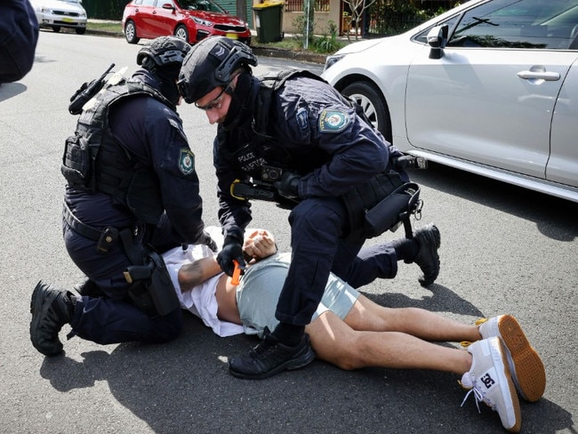 Raptor Squad officers arrest a 38-year-old man in Dulwich Hill, seizing over half a kilo of cocaine. Picture: NSW Police