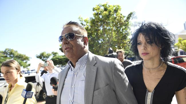 Ken Lacey arrives with wife Madeleine at the Southport Magistrates Court on the Gold Coast, Thursday, May 10, 2018. Arrested in 2015 as part of a Crime and Corruption Commission investigation into a Queensland drug ring, Lacey pleaded guilty to five counts including supplying 12 grams of pure cocaine and possessing methamphetamine. (AAP Image/Dave Hunt)