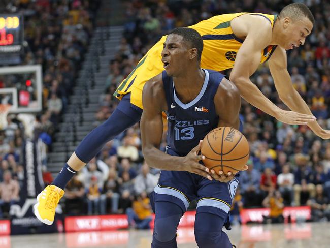 Dante Exum rocking the bright yellow shoes to match his Jazz kit. Picture: AP