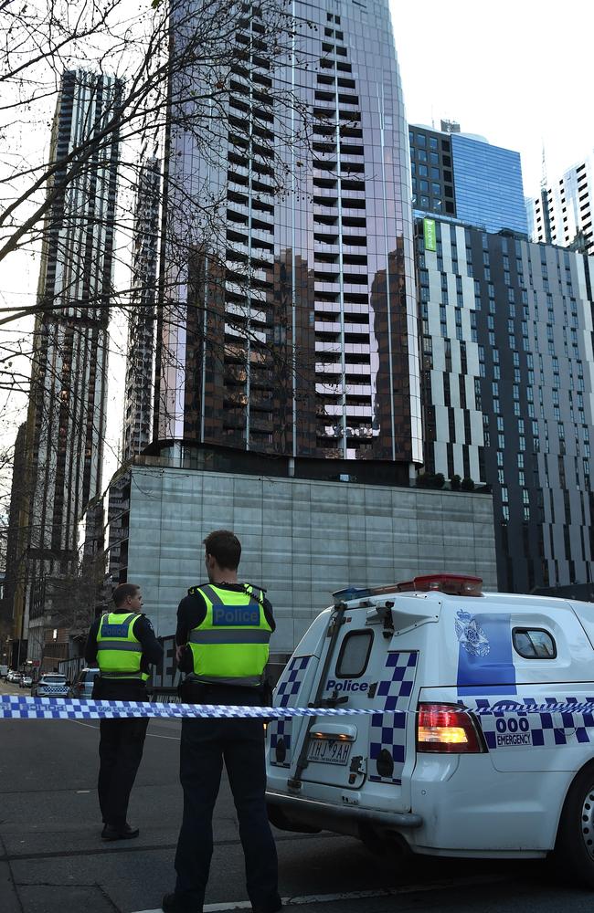 Police cordon off the area around Eq tower on Saturday. Picture: Nicole Garmston