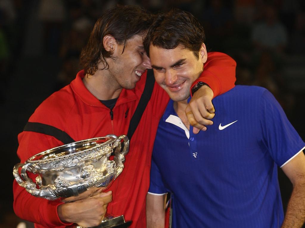 An exhausted Nadal consoles Roger Federer after another epic final where the Spaniard prevailed, this time in Australia, 2009. Picture: Quinn Rooney/Getty Images