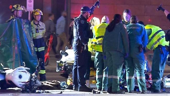 The 25-year-old rider’s bike rear-ended a ute at the intersection of King William Road and North Terrace. Picture: 7NEWS