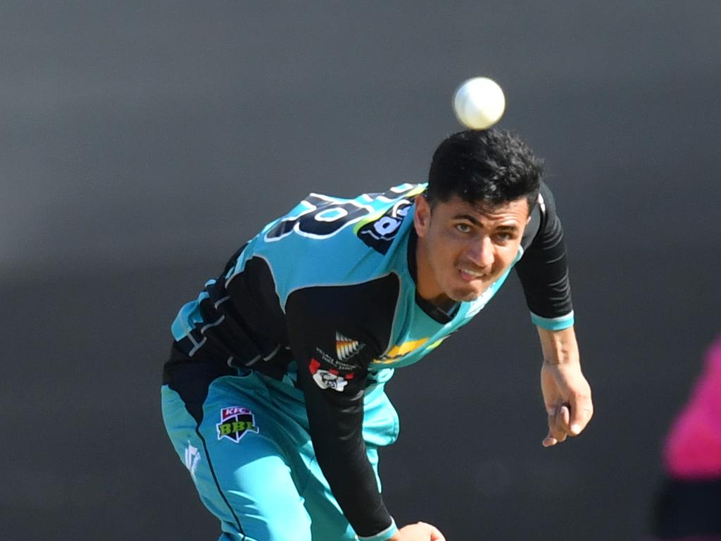 Mujeeb Ur Rahman of the Heat in action during the Big Bash League. (AAP Image/Darren England)