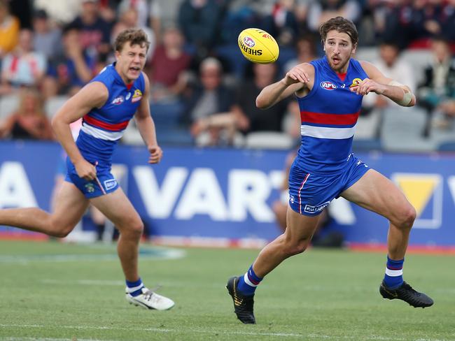 Western Bulldogs v St Kilda at Mars Stadium, Ballarat. 09/03/2019 .   Western Bulldogs Marcus Bontempelli receives the handball on the run    . Pic: Michael Klein