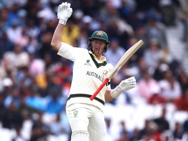 Marnus Labuschagne drops his bat after copping a nasty rising delivery on day 1 at The Oval. (Photo by Ben Hoskins/Getty Images for Surrey CCC)