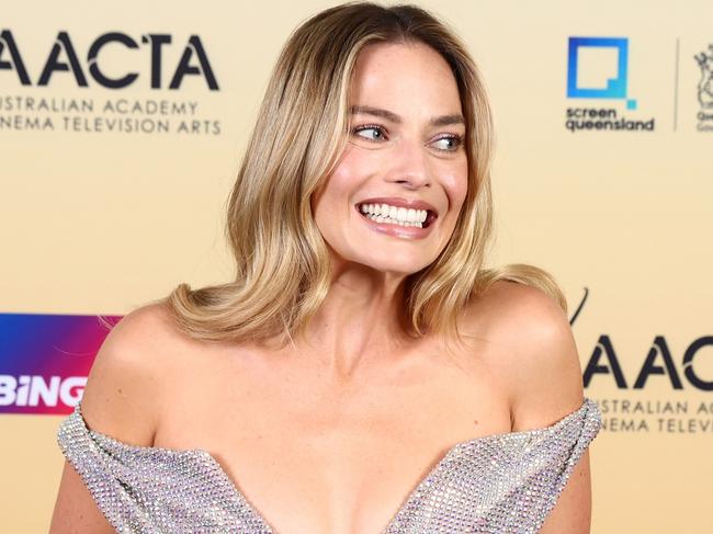 GOLD COAST, AUSTRALIA - FEBRUARY 10: Margot Robbie poses with the AACTA Audience Choice Award for Favourite Actress during the 2024 AACTA Awards Presented By Foxtel Group at HOTA (Home of the Arts) on February 10, 2024 in Gold Coast, Australia. (Photo by Chris Hyde/Getty Images for AFI)