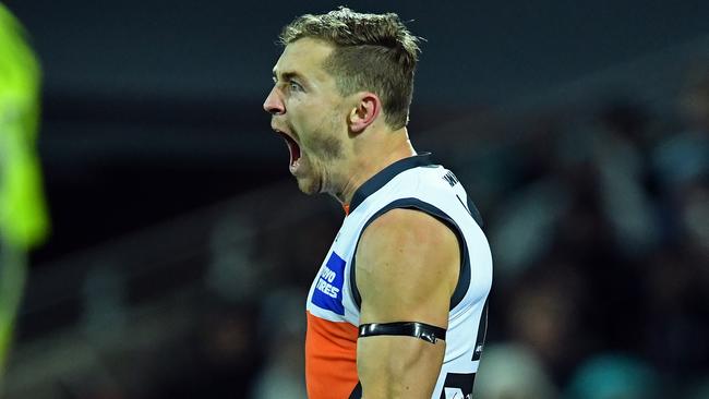 24/07/16 - AFL- Port Adelaide v GWS at Adelaide Oval. Greater Western SydneyÕs Devon Smith celebrates after kicking a goal. Photo Tom Huntley