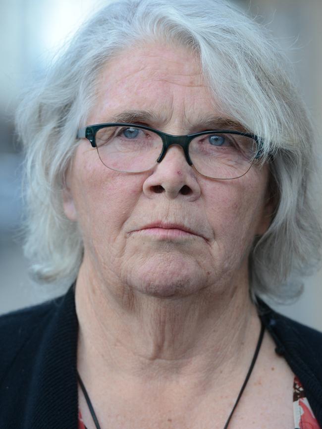 Sue Dansie, the sister of Peter, leaves Adelaide Magistrates Court after her brother appeared, charged with the murder of his wife Helen. Picture: AAP/Brenton Edwards