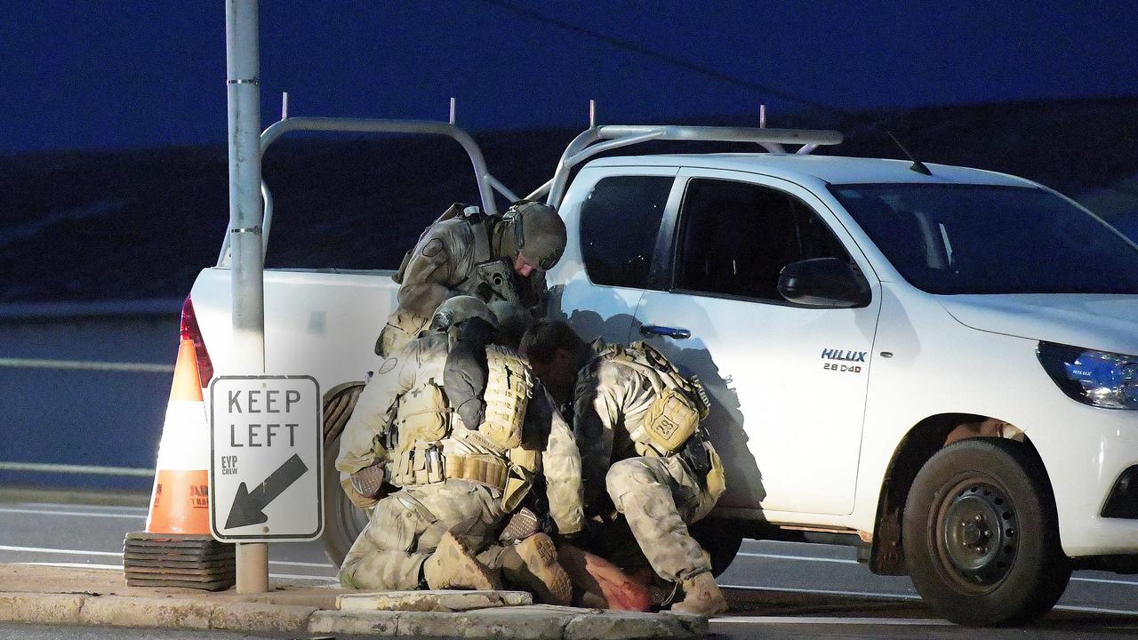 A man is held down by police in Darwin Picture: Keri Megelus