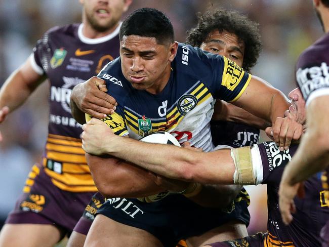 Cowboys forward Jason Taumalolo tries to break a tackle during the 2015 NRL grand final win over the Brisbane Broncos at ANZ Stadium. Picture: Gregg Porteous